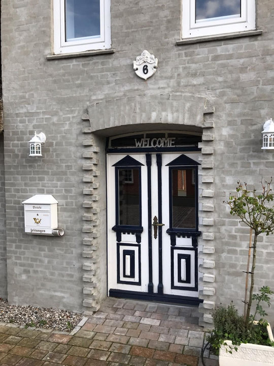 Renoveret teglfacade — omfugning og facadearbejde Syddanmark